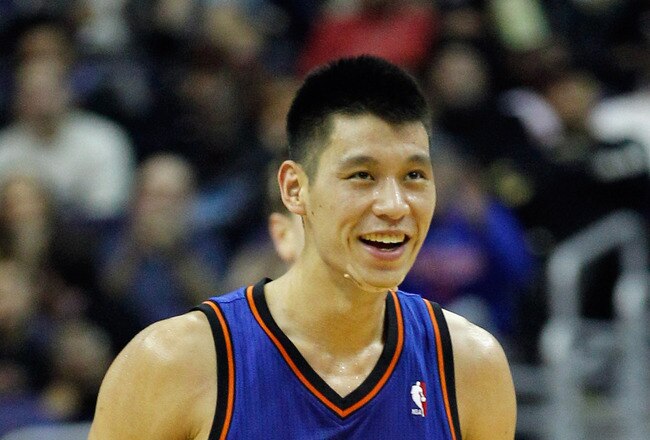 WASHINGTON, DC - FEBRUARY 08:  Jeremy Lin #17 of the New York Knicks smiles after scoring against the Washington Wizards during the second half at Verizon Center on February 8, 2012 in Washington, DC.   NOTE TO USER: User expressly acknowledges and agrees that, by downloading and or using this photograph, User is consenting to the terms and conditions of the Getty Images License Agreement.  (Photo by Rob Carr/Getty Images)