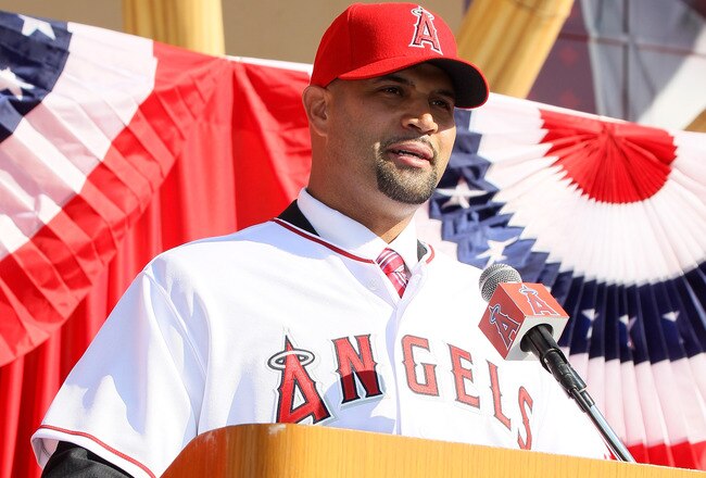 ANAHEIM, CA - DECEMBER 10:  Albert Pujols speaks at a public press conference introducing newly signed Los Angeles Angels of Anaheim  players Pujols and C.J. Wilson at Angel Stadium on December 10, 2011 in Anaheim, California.  (Photo by Stephen Dunn/Getty Images)