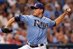 ST PETERSBURG, FL - OCTOBER 04:  Pitcher Matt Moore #55 of the Tampa Bay Rays pitches against the Texas Rangers during Game Four of the American League Division Series at Tropicana Field on October 4, 2011 in St. Petersburg, Florida.  (Photo by J. Meric/Getty Images)
