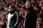 LIVERPOOL, ENGLAND - JANUARY 28:  Manchester United Manager Sir Alex Ferguson and Liverpool Manager Kenny Dalglish (L) look on during the FA Cup Fourth Round match between Liverpool and Manchester United at Anfield on January 28, 2012 in Liverpool, England.  (Photo by Alex Livesey/Getty Images)