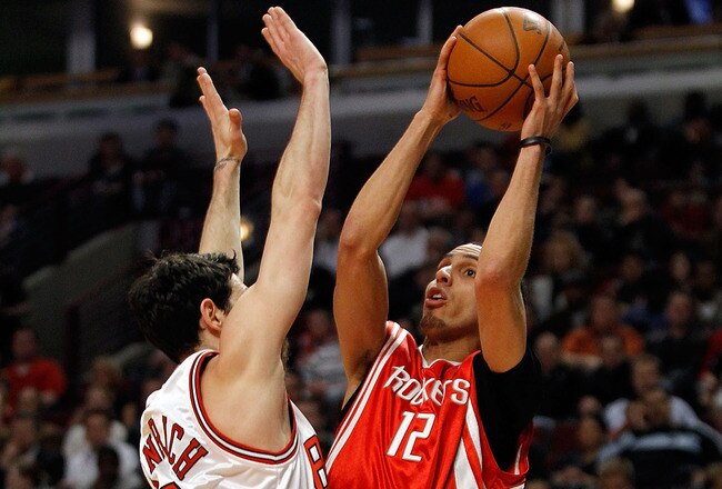 CHICAGO - MARCH 22: Kevin Martin #12 of the Houston Rockets puts up a shot and is fouled by Kirk Hinrich #12 of the Chicago Bulls at the United Center on March 22, 2010 in Chicago, Illinois. The Bulls defeated the Rockets 98-88. NOTE TO USER: User expressly acknowledges and agrees that, by downloading and/or using this Photograph, User is consenting to the terms and conditions of the Getty Images License Agreement. (Photo by Jonathan Daniel/Getty Images)