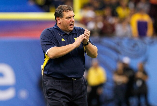 NEW ORLEANS, LA - JANUARY 03:  Head coach Brady Hoke of the Michigan Wolverines applauds his teams play against the Virginia Tech Hokies during the Allstate Sugar Bowl at Mercedes-Benz Superdome on January 3, 2012 in New Orleans, Louisiana.  (Photo by Kevin C. Cox/Getty Images)