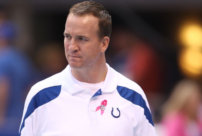 INDIANAPOLIS, IN - OCTOBER 09: Peyton Manning of the Indianapolis Colts watches his team warm up before the NFL game against the Kansas City Chiefs at Lucas Oil Stadium on October 9, 2011 in Indianapolis, Indiana.  (Photo by Andy Lyons/Getty Images)