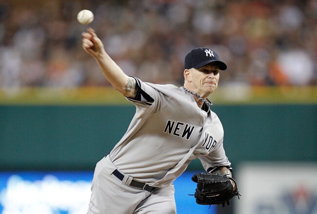 DETROIT, MI - OCTOBER 04:  A.J. Burnett #34 of the New York Yankees throws a pitch against the Detroit Tigers in the first inning of Game Four of the American League Division Series at Comerica Park on October 4, 2011 in Detroit, Michigan.  (Photo by Gregory Shamus/Getty Images)
