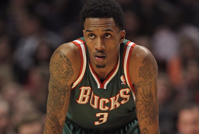 CHICAGO, IL - JANUARY 27:  Brandon Jennings #3 of the Milwaukee Bucks waits as a player for the Chicago Bulls shoots a free-throw at the United Center on January 27, 2012 in Chicago, Illinois. The Bulls defeated the Bucks 107-100. NOTE TO USER: User expressly acknowledges and agrees that, by downloading and or using this photograph, User is consenting to the terms and conditions of the Getty Images License Agreement.  (Photo by Jonathan Daniel/Getty Images)