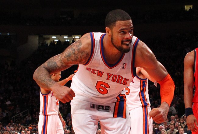 NEW YORK, NY - DECEMBER 21:  Tyson Chandler #6 of the New York Knicks celebrates a basket against the New Jersey Nets during their pre season game  at Madison Square Garden on December 21, 2011 in New York City. NOTE TO USER: User expressly acknowledges and agrees that, by downloading and or using this photograph, User is consenting to the terms and conditions of the Getty Images License Agreement.   (Photo by Al Bello/Getty Images)