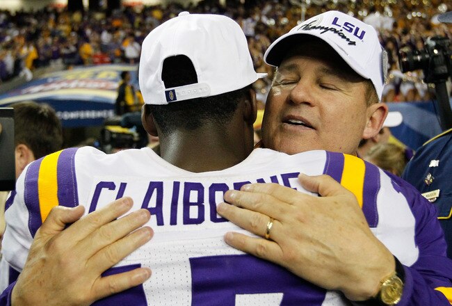 ATLANTA, GA - DECEMBER 03:  Head coach Les Miles and Morris Claiborne #17 of the LSU Tigers celebrate their 42-10 win over the Georgia Bulldogs during the 2011 SEC Championship Game at Georgia Dome on December 3, 2011 in Atlanta, Georgia.  (Photo by Kevin C. Cox/Getty Images)
