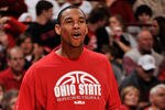 COLUMBUS, OH - DECEMBER 3:  Jared Sullinger #0 of the Ohio State Buckeyes cheers his team on from the sidelines as the Buckeyes take on the Texas Pan American Broncs on December 3, 2011 at Value City Arena in Columbus, Ohio. Sullinger sat out the game because of back spasms.  (Photo by Jamie Sabau/Getty Images)