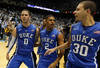 CHAPEL HILL, NC - FEBRUARY 08:  Austin Rivers #0 of the Duke Blue Devils celebrates with teammates Seth Curry #30 and Quinn Cook #2 after hitting a game-winning 3 pointer to defeat the North Carolina Tar Heels 85-84 during their game at the Dean Smith Center on February 8, 2012 in Chapel Hill, North Carolina.  (Photo by Streeter Lecka/Getty Images)