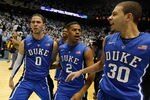 CHAPEL HILL, NC - FEBRUARY 08:  Austin Rivers #0 of the Duke Blue Devils celebrates with teammates Seth Curry #30 and Quinn Cook #2 after hitting a game-winning 3 pointer to defeat the North Carolina Tar Heels 85-84 during their game at the Dean Smith Center on February 8, 2012 in Chapel Hill, North Carolina.  (Photo by Streeter Lecka/Getty Images)