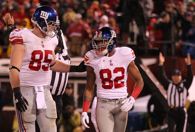 SAN FRANCISCO, CA - JANUARY 22:  (L-R) Jake Ballard #85 and Mario Manningham #82 of the New York Giants celebrate after Manningham scored a 17-yard touchdown reception in the fourth quarter against the San Francisco 49ers during the NFC Championship Game at Candlestick Park on January 22, 2012 in San Francisco, California.  (Photo by Doug Pensinger/Getty Images)