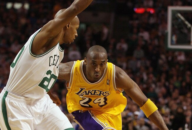 BOSTON, MA - FEBRUARY 10:  Kobe Bryant #24 of the Los Angeles Lakers drives around Ray Allen #20 of the Boston Celtics on February 10, 2011 at the TD Garden in Boston, Massachusetts.  The Lakers defeated the Celtics 92-86. NOTE TO USER: User expressly acknowledges and agrees that, by downloading and/or using this Photograph, User is consenting to the terms and conditions of the Getty Images License Agreement.  (Photo by Elsa/Getty Images)