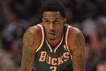 CHICAGO, IL - JANUARY 27:  Brandon Jennings #3 of the Milwaukee Bucks waits as a player for the Chicago Bulls shoots a free-throw at the United Center on January 27, 2012 in Chicago, Illinois. The Bulls defeated the Bucks 107-100. NOTE TO USER: User expressly acknowledges and agrees that, by downloading and or using this photograph, User is consenting to the terms and conditions of the Getty Images License Agreement.  (Photo by Jonathan Daniel/Getty Images)