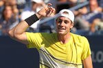 NEW YORK, NY - SEPTEMBER 09:  John Isner of the United States celebrates after a point against Andy Murray of Great Britain during Day Twelve of the 2011 US Open at the USTA Billie Jean King National Tennis Center on September 9, 2011 in the Flushing neighborhood of the Queens borough of New York City.  (Photo by Al Bello/Getty Images)