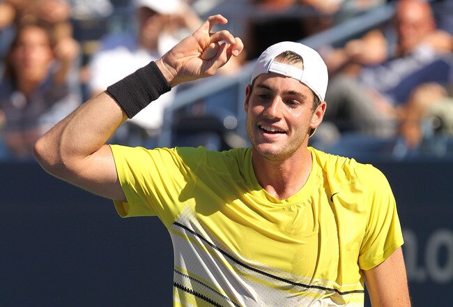 NEW YORK, NY - SEPTEMBER 09:  John Isner of the United States celebrates after a point against Andy Murray of Great Britain during Day Twelve of the 2011 US Open at the USTA Billie Jean King National Tennis Center on September 9, 2011 in the Flushing neighborhood of the Queens borough of New York City.  (Photo by Al Bello/Getty Images)