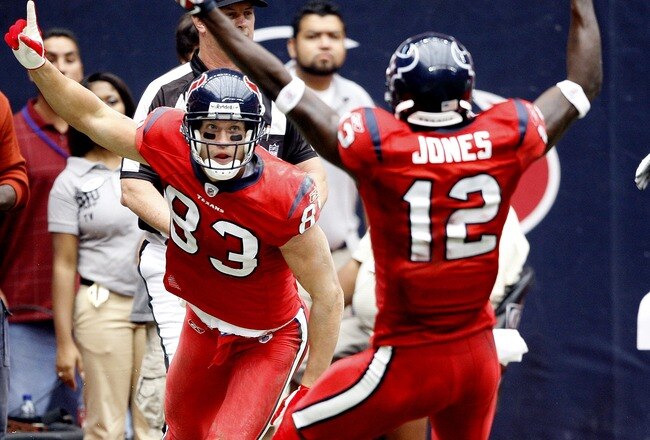 HOUSTON - SEPTEMBER 27:  Wide receiver Kevin Walter #83 of the Houston Texans celebrates with Jacoby Jones #12 after his touchdown catch in the second quarter against the Jacksonville Jaguars at Reliant Stadium on September 27, 2009 in Houston, Texas.  (Photo by Bob Levey/Getty Images)