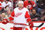 GLENDALE, AZ - JANUARY 19:  Tomas Holmstrom #96 of the Detroit Red Wings during the NHL game against  the Phoenix Coyotes at Jobing.com Arena on January 19, 2011 in Glendale, Arizona.  The Red Wings defeated the Coyotes 3-2 in an overtime shoot out.  (Photo by Christian Petersen/Getty Images)