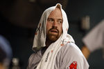 HOUSTON - JULY 03:  Kevin Youkilis #20 of the Boston Red Sox looks on from the dugout during a baseball game against the Houston Astros at Minute Maid Park on July 3, 2011 in Houston, Texas.  (Photo by Bob Levey/Getty Images)