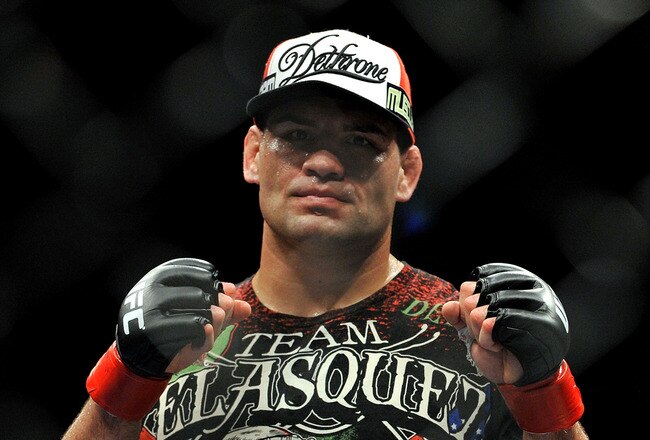 LOS ANGELES, CA - OCTOBER 24:  UFC fighter Cain Velasquez poses after his victory over UFC fighter Ben Rothwell (not pictured) in their Heavyweight bout at UFC 104: Machida vs. Shogun at Staples Center on October 24, 2009 in Los Angeles, California.  Velasquez won the fight by way of TKO.  (Photo by Jon Kopaloff/Getty Images)
