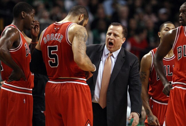 BOSTON, MA - JANUARY 13:  Head coach Tom Thibodeau talks with his players during a time out in the fourth quarter against the Boston Celtics on January 13, 2012 at TD Garden in Boston, Massachusetts. The Chicago Bulls defeated the Boston Celtics 88-79. NOTE TO USER: User expressly acknowledges and agrees that, by downloading and or using this photograph, User is consenting to the terms and conditions of the Getty Images License Agreement.  (Photo by Elsa/Getty Images)