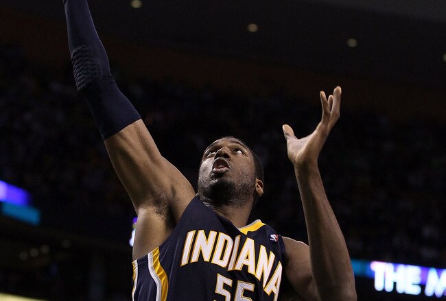 BOSTON, MA - JANUARY 06:  Roy Hibbert #55 of the Indiana Pacers grabs the rebound in the second half against the Boston Celtics on January 6, 2012 at TD Garden in Boston, Massachusetts. The Indiana Pacers defeated the Boston Celtics 87-74. NOTE TO USER: User expressly acknowledges and agrees that, by downloading and or using this photograph, User is consenting to the terms and conditions of the Getty Images License Agreement.  (Photo by Elsa/Getty Images)
