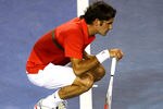 MELBOURNE, AUSTRALIA - JANUARY 26:  Roger Federer of Switzerland looks at a line call in his semifinal match against Rafael Nadal of Spain during day eleven of the 2012 Australian Open at Melbourne Park on January 26, 2012 in Melbourne, Australia.  (Photo by Robert Prezioso/Getty Images)
