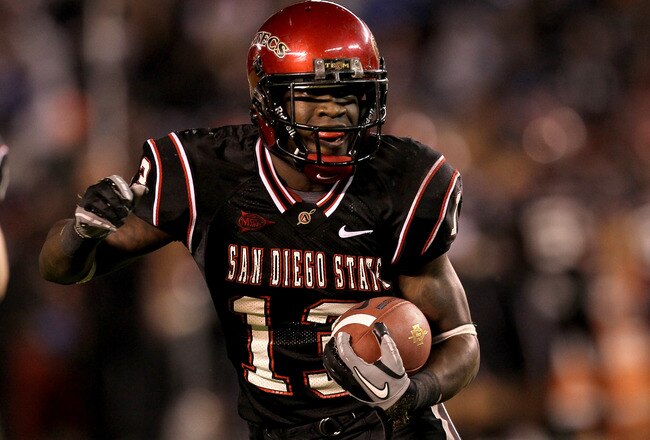 SAN DIEGO - NOVEMBER 20:  Running back Ronnie Hillman #13 of the San Deigo State Aztecs carries the ball on a five yard touchdown run in the second quarter against the Utah Utes at Qualcomm Stadium on November 20, 2010 in San Diego, California.  (Photo by Stephen Dunn/Getty Images)