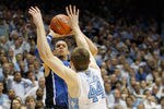 CHAPEL HILL, NC - FEBRUARY 08:  Austin Rivers #0 of the Duke Blue Devils shoots the game-winning 3 pointer over Tyler Zeller #44 to defeat the North Carolina Tar Heels 85-84 during their game at the Dean Smith Center on February 8, 2012 in Chapel Hill, North Carolina.  (Photo by Streeter Lecka/Getty Images)