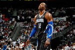 ATLANTA, GA - APRIL 28:  Dwight Howard #12 of the Orlando Magic walks to the bench after a turnover to the Atlanta Hawks during Game Six of the Eastern Conference Quarterfinals in the 2011 NBA Playoffs at Philips Arena on April 28, 2011 in Atlanta, Georgia.  NOTE TO USER: User expressly acknowledges and agrees that, by downloading and or using this photograph, User is consenting to the terms and conditions of the Getty Images License Agreement.  (Photo by Kevin C. Cox/Getty Images)