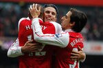 LONDON, ENGLAND - FEBRUARY 04:  Thierry Henry, Robin van Persie and Yossi Benayoun celebrate after Henry scores Arsenals's seventh go during the Barclays Premier League match between Arsenal and Blackburn Rovers at Emirates Stadium on February 4, 2012 in London, England.  (Photo by Paul Gilham/Getty Images)