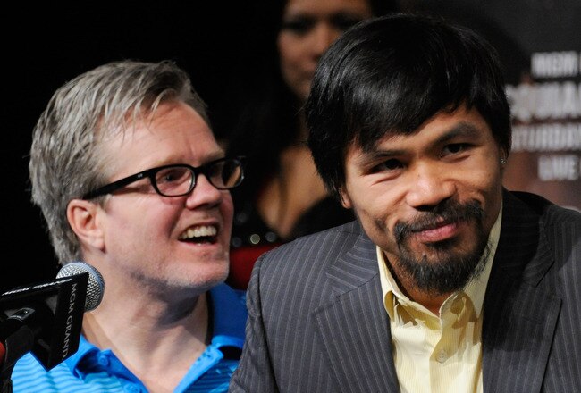 LAS VEGAS, NV - NOVEMBER 09:  Trainer Freddie Roach (L) and boxer Manny Pacquiao appear during the final news conference for Pacquiao's bout with Juan Manuel Marquez at the MGM Grand Hotel/Casino November 9, 2011 in Las Vegas, Nevada. Pacquiao will defend his WBO welterweight title against Marquez when the two meet in the ring for the third time on November 12 in Las Vegas.  (Photo by Ethan Miller/Getty Images)