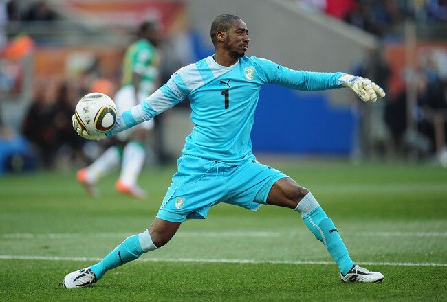NELSPRUIT, SOUTH AFRICA - JUNE 25:  Boubacar Barry of the Ivory Coast throws the ball out during the 2010 FIFA World Cup South Africa Group G match between North Korea and Ivory Coast at the Mbombela Stadium on June 25, 2010 in Nelspruit, South Africa.  (Photo by Clive Mason/Getty Images)