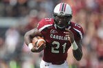 COLUMBIA, SC - OCTOBER 08:  Marcus Lattimore #21 of the South Carolina Gamecocks runs with the ball against the Kentucky Wildcats during their game at Williams-Brice Stadium on October 8, 2011 in Columbia, South Carolina.  (Photo by Streeter Lecka/Getty Images)