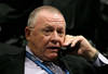 LOS ANGELES, CA - JUNE 25:  Carolina Hurricanes President and General Manager Jim Rutherford speaks on the phone during the 2010 NHL Entry Draft at Staples Center on June 25, 2010 in Los Angeles, California.  (Photo by Bruce Bennett/Getty Images)