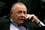 LOS ANGELES, CA - JUNE 25:  Carolina Hurricanes President and General Manager Jim Rutherford speaks on the phone during the 2010 NHL Entry Draft at Staples Center on June 25, 2010 in Los Angeles, California.  (Photo by Bruce Bennett/Getty Images)