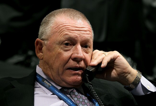 LOS ANGELES, CA - JUNE 25:  Carolina Hurricanes President and General Manager Jim Rutherford speaks on the phone during the 2010 NHL Entry Draft at Staples Center on June 25, 2010 in Los Angeles, California.  (Photo by Bruce Bennett/Getty Images)