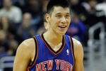 WASHINGTON, DC - FEBRUARY 08:  Jeremy Lin #17 of the New York Knicks smiles after scoring against the Washington Wizards during the second half at Verizon Center on February 8, 2012 in Washington, DC.   NOTE TO USER: User expressly acknowledges and agrees that, by downloading and or using this photograph, User is consenting to the terms and conditions of the Getty Images License Agreement.  (Photo by Rob Carr/Getty Images)