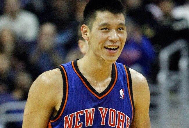 WASHINGTON, DC - FEBRUARY 08:  Jeremy Lin #17 of the New York Knicks smiles after scoring against the Washington Wizards during the second half at Verizon Center on February 8, 2012 in Washington, DC.   NOTE TO USER: User expressly acknowledges and agrees that, by downloading and or using this photograph, User is consenting to the terms and conditions of the Getty Images License Agreement.  (Photo by Rob Carr/Getty Images)