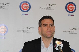 CHICAGO, IL - NOVEMBER 18:  President Theo Epstein of the Chicago Cubs (R) introdues new manager Dale Sveum during a press conference at Wrigley Field on November 18, 2011 in Chicago, Illinois.  (Photo by Jonathan Daniel/Getty Images)