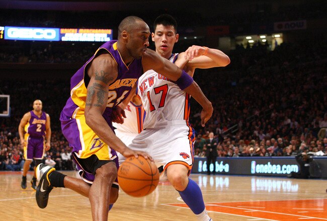 NEW YORK, NY - FEBRUARY 10:  Kobe Bryant #24 of the Los Angeles Lakers drives in the second quarter against Jeremy Lin #17 of the New York Knicks at Madison Square Garden on February 10, 2012 in New York City.  NOTE TO USER: User expressly acknowledges and agrees that, by downloading and or using this photograph, User is consenting to the terms and conditions of the Getty Images License Agreement.  (Photo by Chris Chambers/Getty Images)