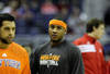 WASHINGTON, DC - JANUARY 06:  Carmelo Anthony #7 of the New York Knicks (C) warms up prior to the start of the Knicks game against the Washington Wizards at Verizon Center on January 6, 2012 in Washington, DC.  NOTE TO USER: User expressly acknowledges and agrees that, by downloading and or using this photograph, User is consenting to the terms and conditions of the Getty Images License Agreement.  (Photo by Rob Carr/Getty Images)