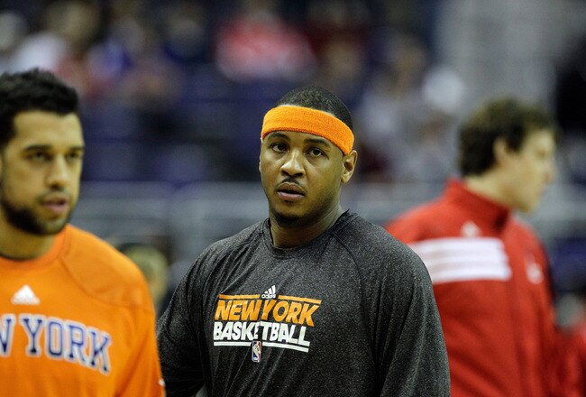 WASHINGTON, DC - JANUARY 06:  Carmelo Anthony #7 of the New York Knicks (C) warms up prior to the start of the Knicks game against the Washington Wizards at Verizon Center on January 6, 2012 in Washington, DC.  NOTE TO USER: User expressly acknowledges and agrees that, by downloading and or using this photograph, User is consenting to the terms and conditions of the Getty Images License Agreement.  (Photo by Rob Carr/Getty Images)
