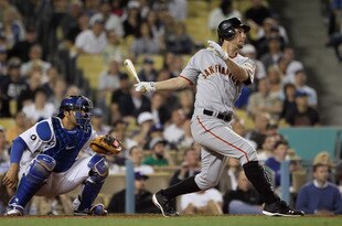 LOS ANGELES, CA - APRIL 01:  Brandon Belt #9 of the San Francisco Giants bats against the Los Angeles Dodgers at Dodger Stadium on April 1, 2011 in Los Angeles, California.  (Photo by Jeff Gross/Getty Images)