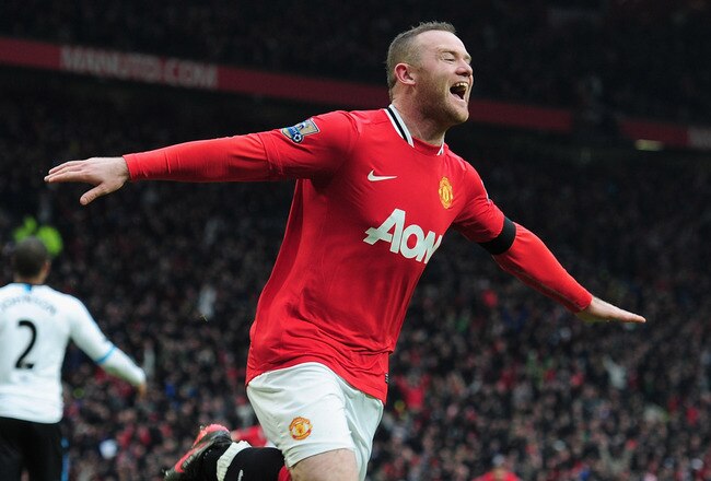 MANCHESTER, ENGLAND - FEBRUARY 11:  Wayne Rooney of Manchester United celebrates scoring his second goal during the Barclays Premier League match between Manchester United and Liverpool at Old Trafford on February 11, 2012 in Manchester, England.  (Photo by Shaun Botterill/Getty Images)