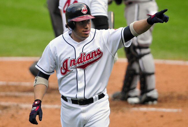 CLEVELAND, OH - SEPTEMBER 20: Asdrubal Cabrera #13 of the Cleveland Indians points to the fans in celebration after he hit a solo home run during the fourth inning against the Chicago White Sox at Progressive Field on September 20, 2011 in Cleveland, Ohio. The Indians defeated the White Sox 4-3 during the first game of a double header. (Photo by Jason Miller/Getty Images)