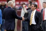LANDOVER, MD - NOVEMBER 20: Dallas Cowboys owner Jerry Jones (L) shakes hands with Washington Redskins owner Daniel Snyder (R) before the start of Redskins and Cowboys game at FedExField on November 20, 2011 in Landover, Maryland.  (Photo by Rob Carr/Getty Images)