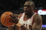 CHICAGO, IL - JANUARY 21:  Loul Deng #9 of the Chicago Bulls passes against the Charlotte Bobcats at the United Center on January 21, 2012 in Chicago, Illinois. The Bulls defeated the Bobcats 95-89. NOTE TO USER: User expressly acknowledges and agrees that, by downloading and or using this photograph, User is consenting to the terms and conditions of the Getty Images License Agreement.  (Photo by Jonathan Daniel/Getty Images)