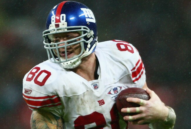 LONDON - OCTOBER 28:  Giants Tight End, Jeremy Shockey #80 carries the ball during the NFL Bridgestone International Series match between New York Giants and  Miami Dolphins at Wembley Stadium on October 28, 2007 in London, England. This is the first ever regular season NFL match to be played outside of the United States.  (Photo by Stu Forster/Getty Images)