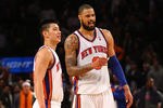 NEW YORK, NY - FEBRUARY 10:  (L-R) Jeremy Lin #17 and Tyson Chandler #6 of the New York Knicks look on against the Los Angeles Lakers at Madison Square Garden on February 10, 2012 in New York City.  NOTE TO USER: User expressly acknowledges and agrees that, by downloading and or using this photograph, User is consenting to the terms and conditions of the Getty Images License Agreement.  (Photo by Chris Chambers/Getty Images)