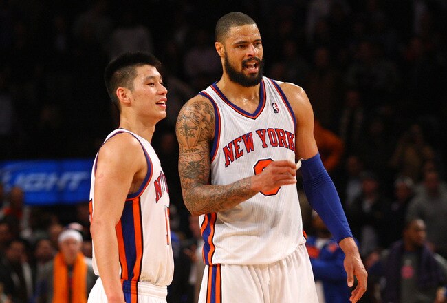 NEW YORK, NY - FEBRUARY 10:  (L-R) Jeremy Lin #17 and Tyson Chandler #6 of the New York Knicks look on against the Los Angeles Lakers at Madison Square Garden on February 10, 2012 in New York City.  NOTE TO USER: User expressly acknowledges and agrees that, by downloading and or using this photograph, User is consenting to the terms and conditions of the Getty Images License Agreement.  (Photo by Chris Chambers/Getty Images)